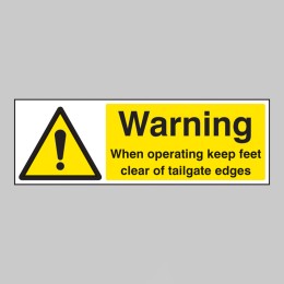 Warning - When Operating Keep Feet Clear of Tailgate Edges - 